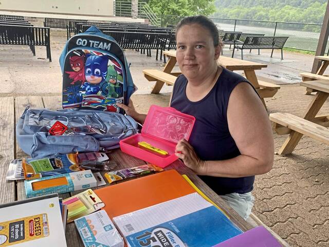 Tarentum woman buys, fills and doles out hundreds of bookbags to kids in need