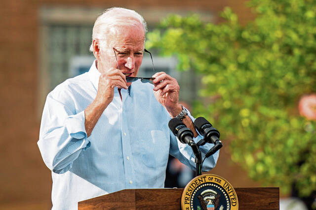 5401398_web1_ptr-biden12-090622