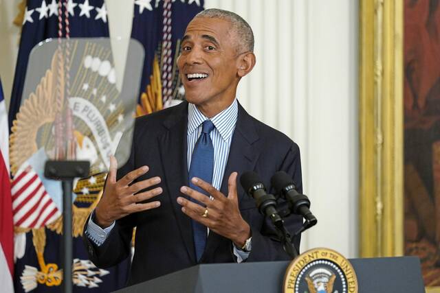 5485389_web1_ptr-ObamaTrump-100122