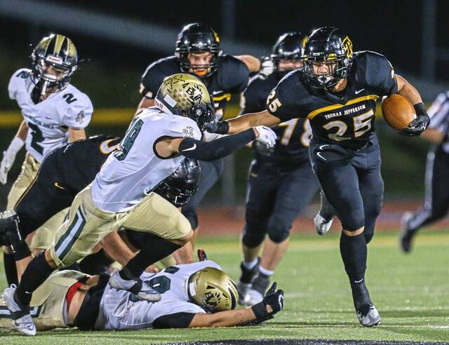 Lippincott twins thrive on Thomas Jefferson volleyball court, football field