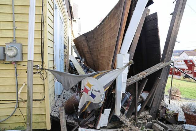 5585284_web1_vnd-PorchRoofCollapse2-100222