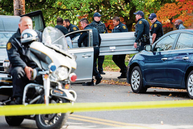 Paramount Press Express  THE SWAT TEAM RACES TO STOP A GUNMAN