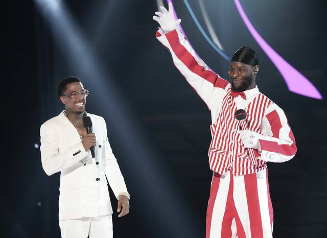 5604174_web1_ptr-Pop-1107022-MaskedSinger