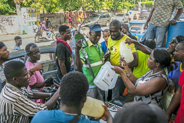 5638605_web1_ptr-haitiunrest-111822