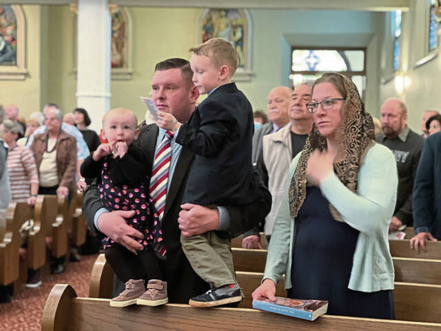 5656501_web1_Andrew-Cain-with-son-Aaron-4-daughter-Sarah-18-months-and-wife-Samantha