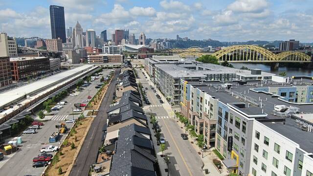 5675711_web1_ptr-StripDistrictHomes-sa-001