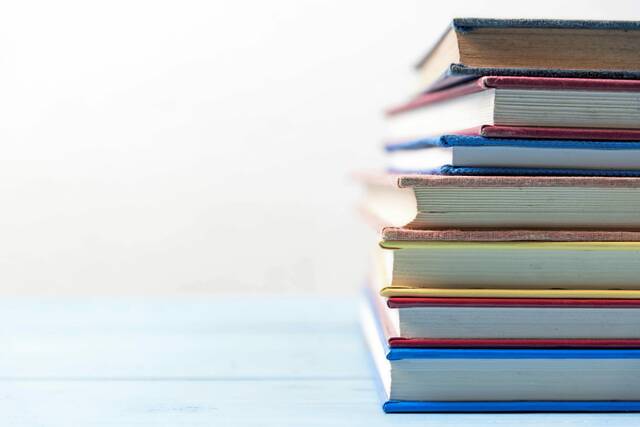 5707580_web1_WEB-stack-of-books