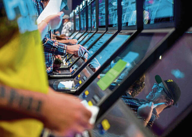 5738552_web1_PTR-SportsBetting01-090819