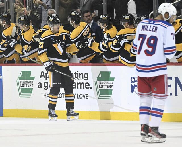 Power-play goals by Malkin, Rust help Pens stop Rangers, 3-2