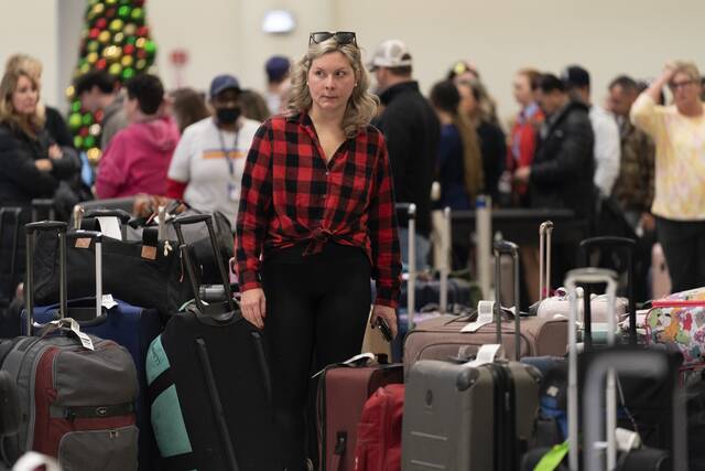 Luggage no longer piled up at Lambert, travel delays continue