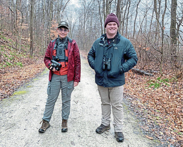 Several hundred birders slough through rain to count thousands of birds, some rare