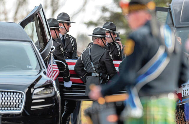 5906560_web1_PTR-SluganskFuneral02-021523
