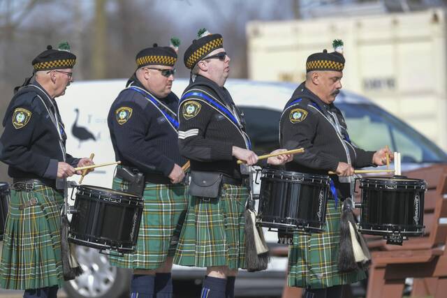 5906560_web1_PTR-SluganskFuneral05-021523