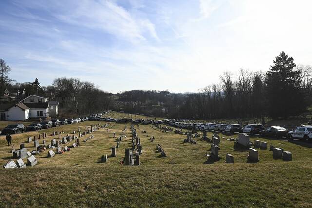 5906560_web1_ptr-sluganskifuneral22-021523