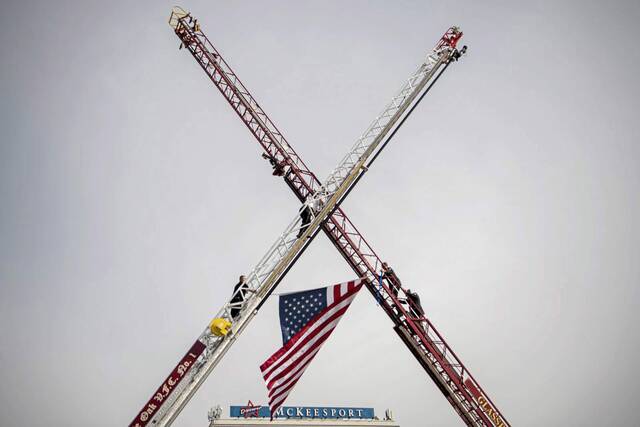 5916709_web1_PTR-sluganskiFUNERAL44-021423