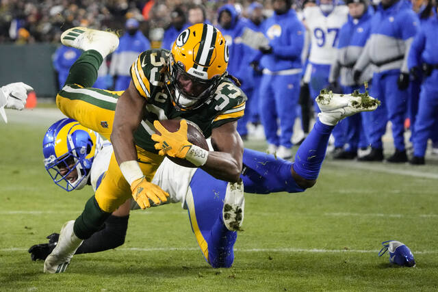 RB Aaron Jones staying with Packers under restructured deal<span class="headline-video">Video <i class="fa-solid fa-circle-play"></i></span>