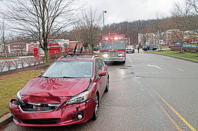 6015190_web1_vnd-MillsRollover5OTHERcar-031823
