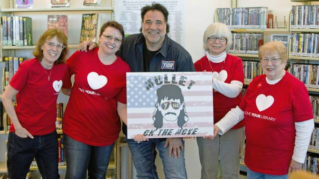 6031565_web1_hj-librarymullet-033023-5