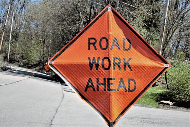 6074992_web1_WEB-road-work-sign