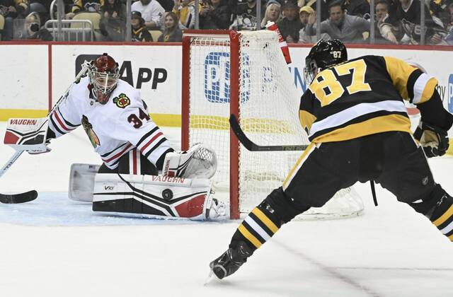 6090336_web1_ptr-PensBlackhawks06-041223jpg