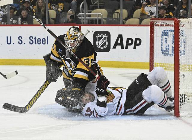 6090336_web1_ptr-PensBlackhawks07-041223jpg
