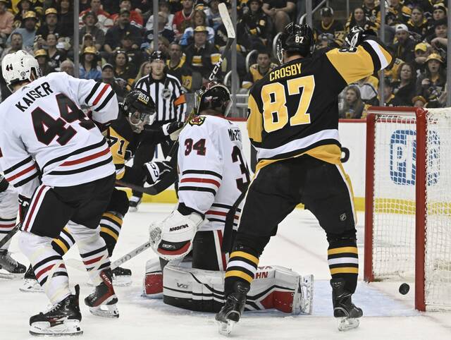6090336_web1_ptr-PensBlackhawks12-041223jpg