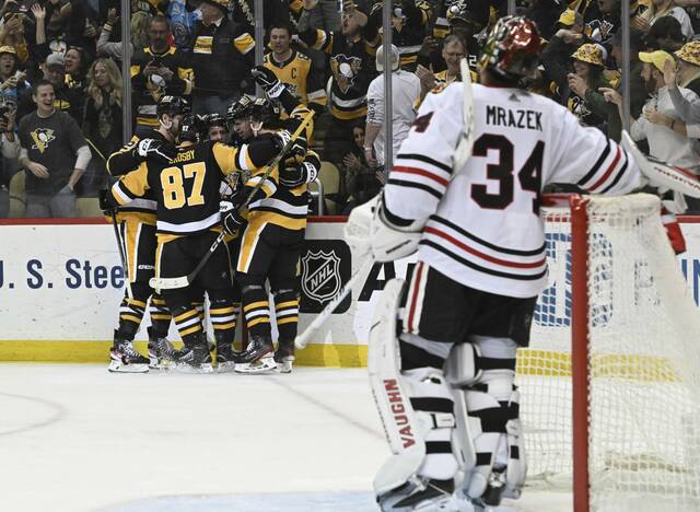 6090336_web1_ptr-PensBlackhawks13-041223jpg