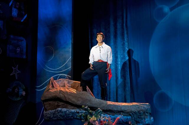 Foreign exchange student makes his mark on stage, court at Penn-Trafford