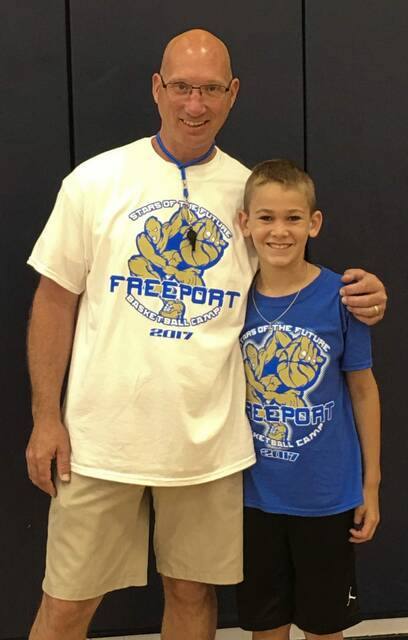 Freeport grad takes over boys basketball program