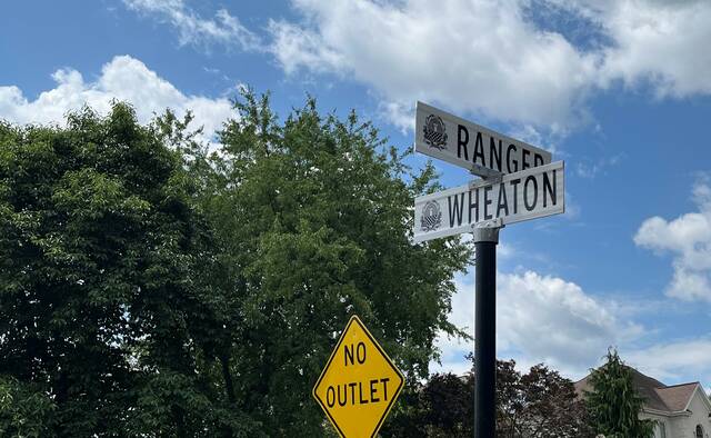 6275575_web1_New-Street-Sign-1-Edited