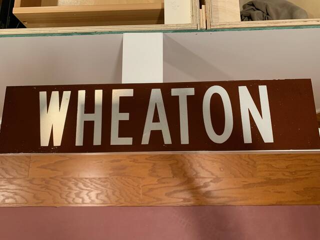6275575_web1_Wheaton-Sign--John-Wotus