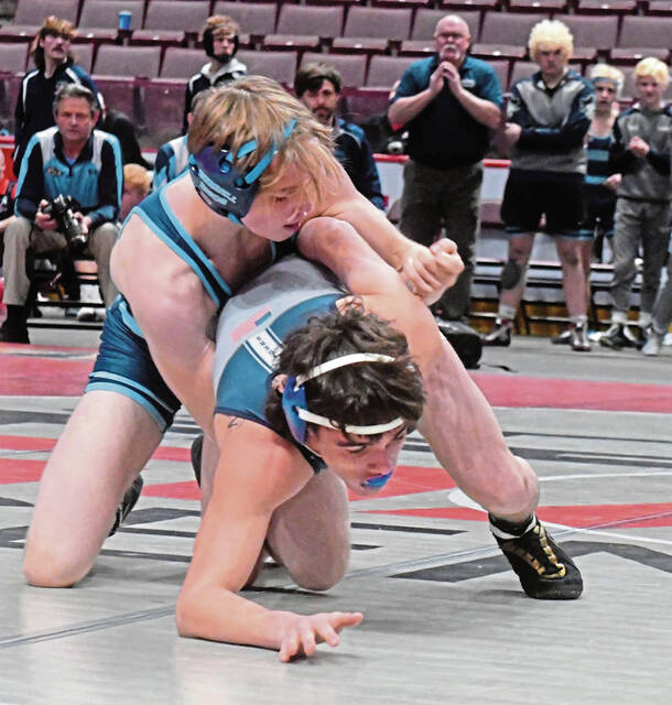 High school wrestling coaches take wait-and-see approach with 3-point takedown