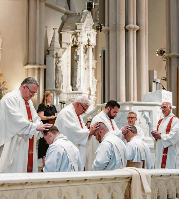 6326706_web1_vnd-newpriests-062523-4