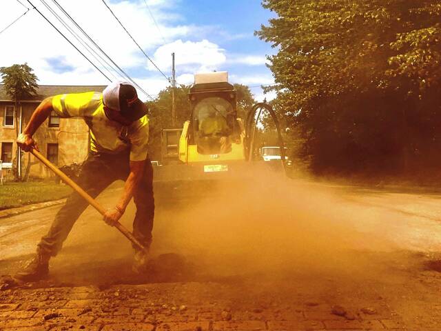 Keep your cool: Outdoor work continues as temperatures soar