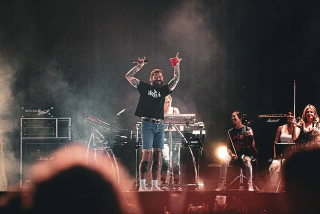 6377106_web1_Postmalone-071323-13