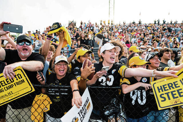 Steelers players appear to embrace the hoopla of their practice before 14,000 fans in Latrobe