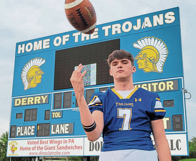 Derry quarterback is 1 of 11 on football field, 1 of 10 at home