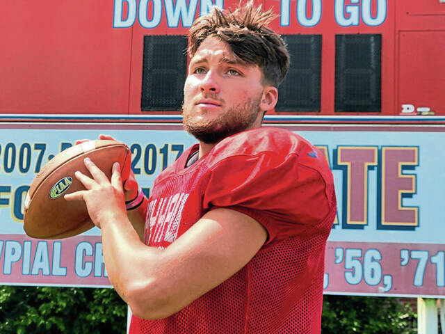 Senior quarterback takes pride in wearing Jeannette uniform