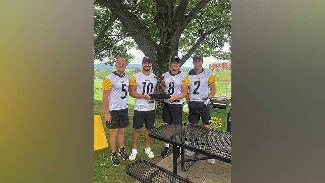 Steelers quarterbacks check out Willie Thrower Award for area’s top QB