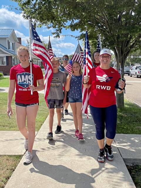 6560103_web1_vnd-flagwalk-091223