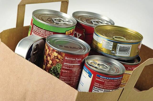 6663051_web1_Cans-in-bag