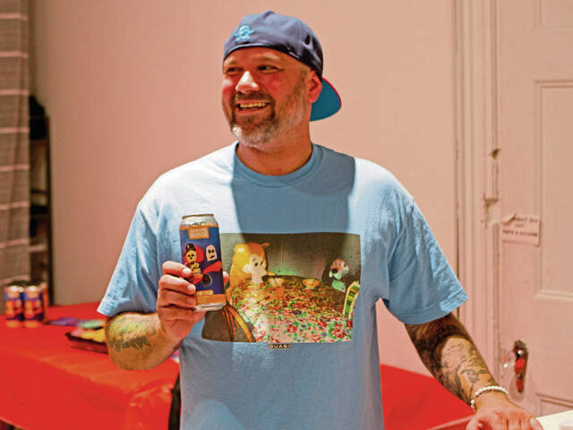 6715807_web1_pal-beercanart-092222-1
