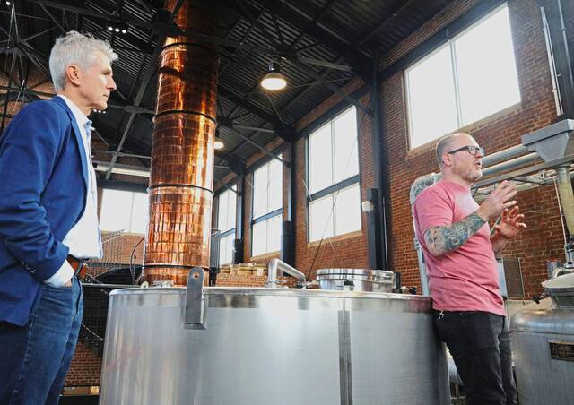 6744688_web1_vnd-IronCityDistilleryLaunch5-110823