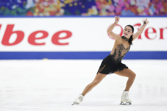 U.S. teenager Ziegler wins NHK Trophy with near-flawless
