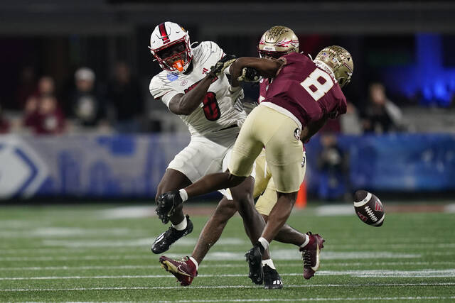 No. 4 Florida State beats No. 15 Louisville 16-6 for ACC title, but could miss playoff at 13-0