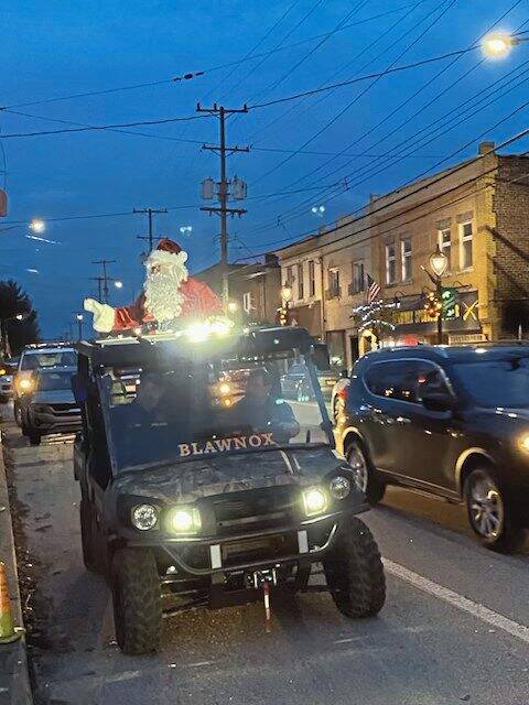 6854423_web1_Night-of-Lights-Santa