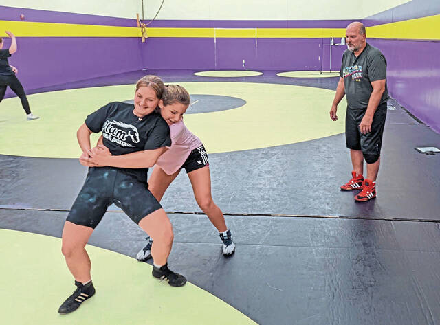 Plum girls wrestlers continue growth in 1st year as PIAA sanctioned sport