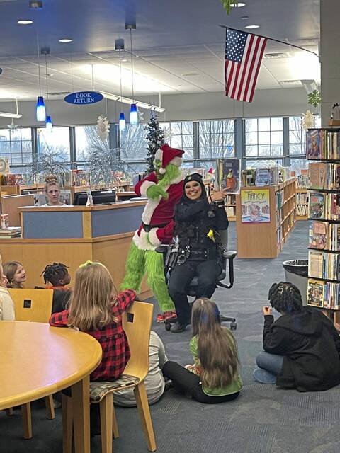 6889235_web1_ptr-Grinch2-122323