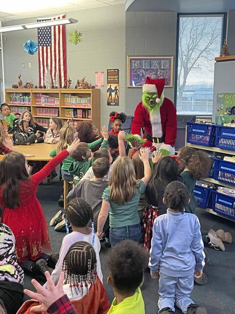 6889235_web1_ptr-Grinch3-122323