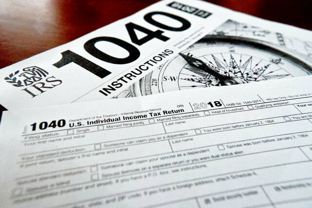 6903787_web1_taxes